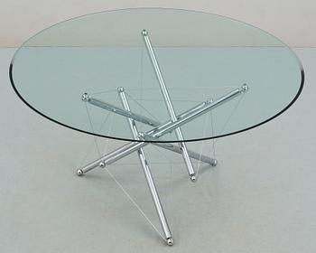 A Theodore Wadell "Wadell" chromium plated steel and glass dinner table, Cassina post 1973.