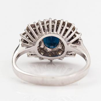 A 14K white gold ring with a sapphire ca. 1.24 ct and diamonds ca 1.25 ct in total. Finnsh import marks 1994.