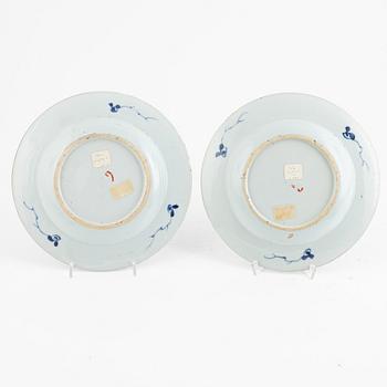 An Imari porcelain bowl and a pair of plates, Qing dynasty, China, 18th century.