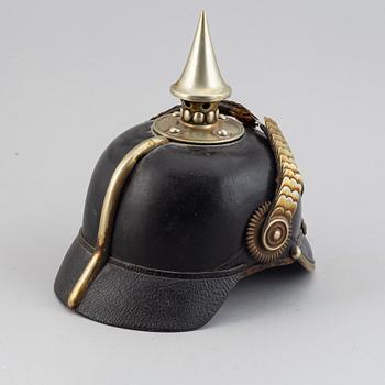 A Swedish spiked helmet 1887 pattern.