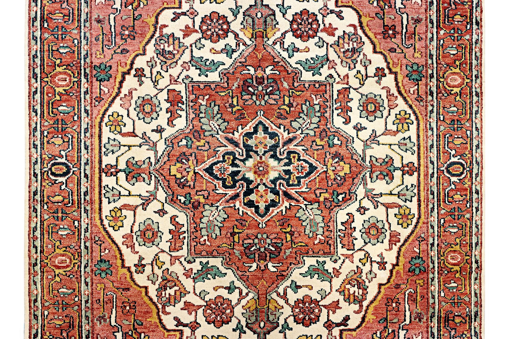 An oriental carpet with Mamluk design, c. 367 x 280 cm.