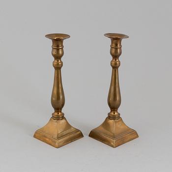 A PAIR OF BRONZE CANDLESTICKS, 19th century.