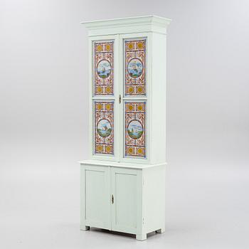 A painted cabinet, circa 1900.