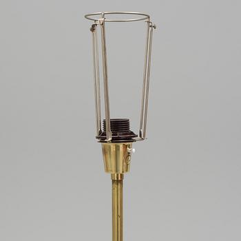 A brass floor lamp by Fagerhult.