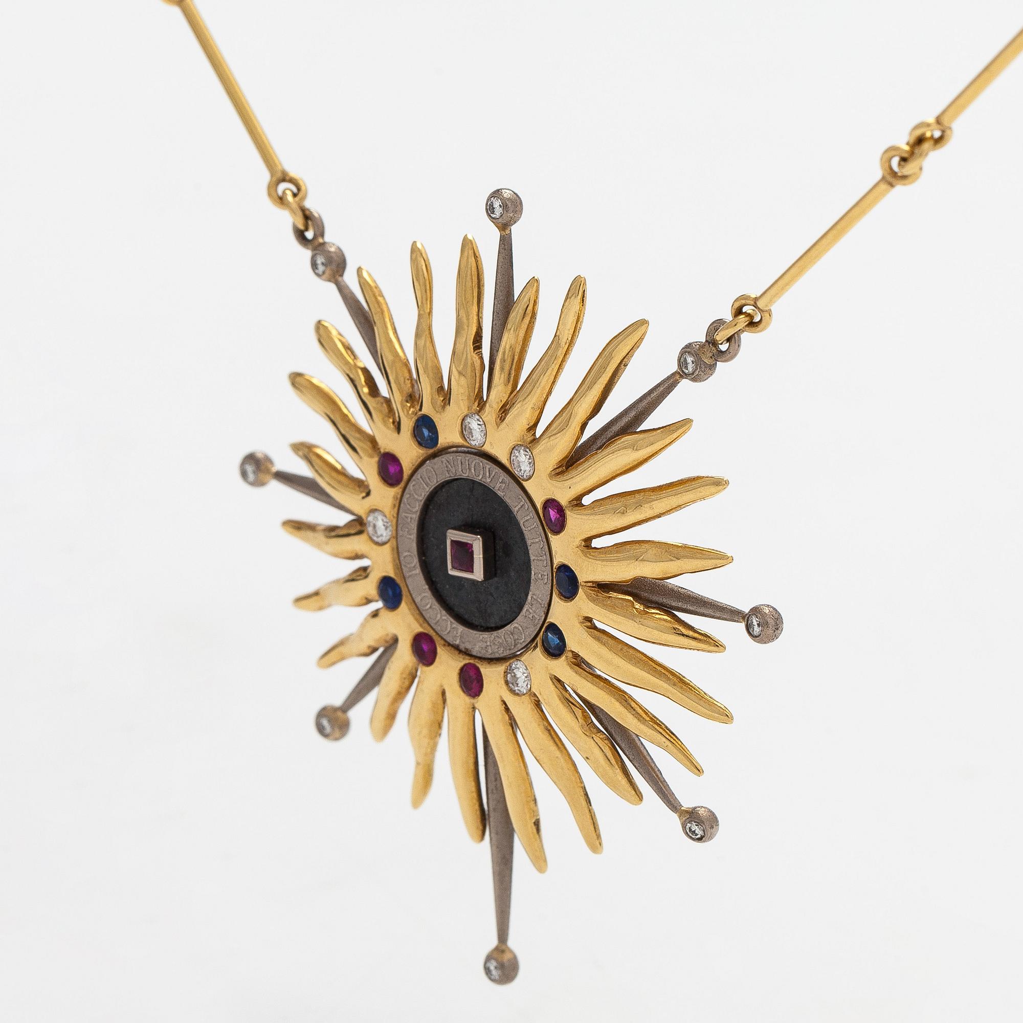 Pendant, faceted sapphires, rubies and diamonds, iron ore, 18K gold and white gold.