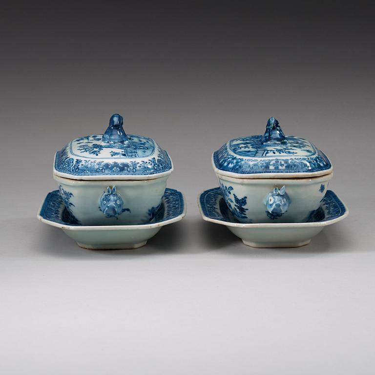 A pair of blue and white butter tureens with covers and stands, Qing dynasty, Qianlong (1736-95).