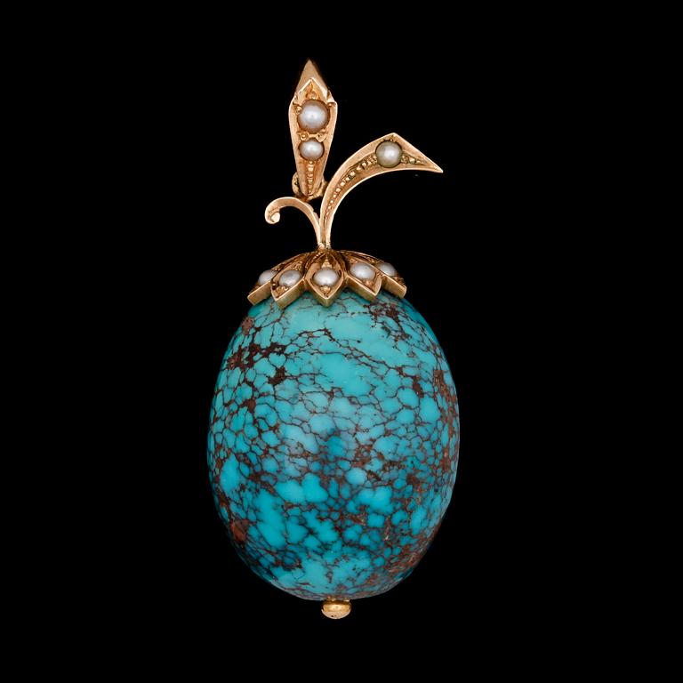 PENDANT, large egg shaped turquise set in gold and small pearls.