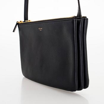 Céline, a black leather 'Trio Small' bag.