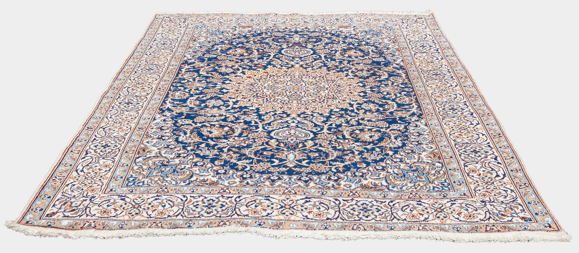 A carpet, Nain, part silk, ca. 295 x 201 cm.