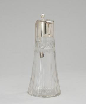 A glass and silver jug, Austria 1901-1921.