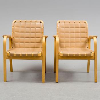 ALVAR AALTO, a pair of mode 45 leather upholstered birch armchairs from Artek, Finland.