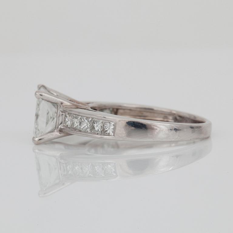 A princess-cut diamond ring. Total carat weight of diamonds circa 2.50 cts.