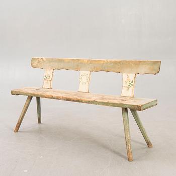 A painted early 1900s bench.