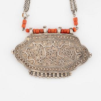 Silver and coral necklace.