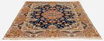 A Tabriz carpet, part silk, c. 206 x 147 cm.
