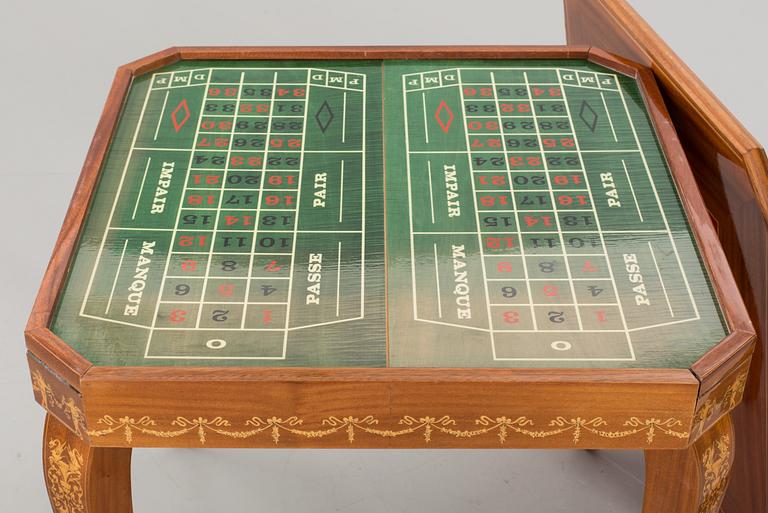 A gaming table and two chairs from Italy, 1950s.