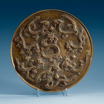 A large bronze mirror, late Qing dynasty with seal mark.