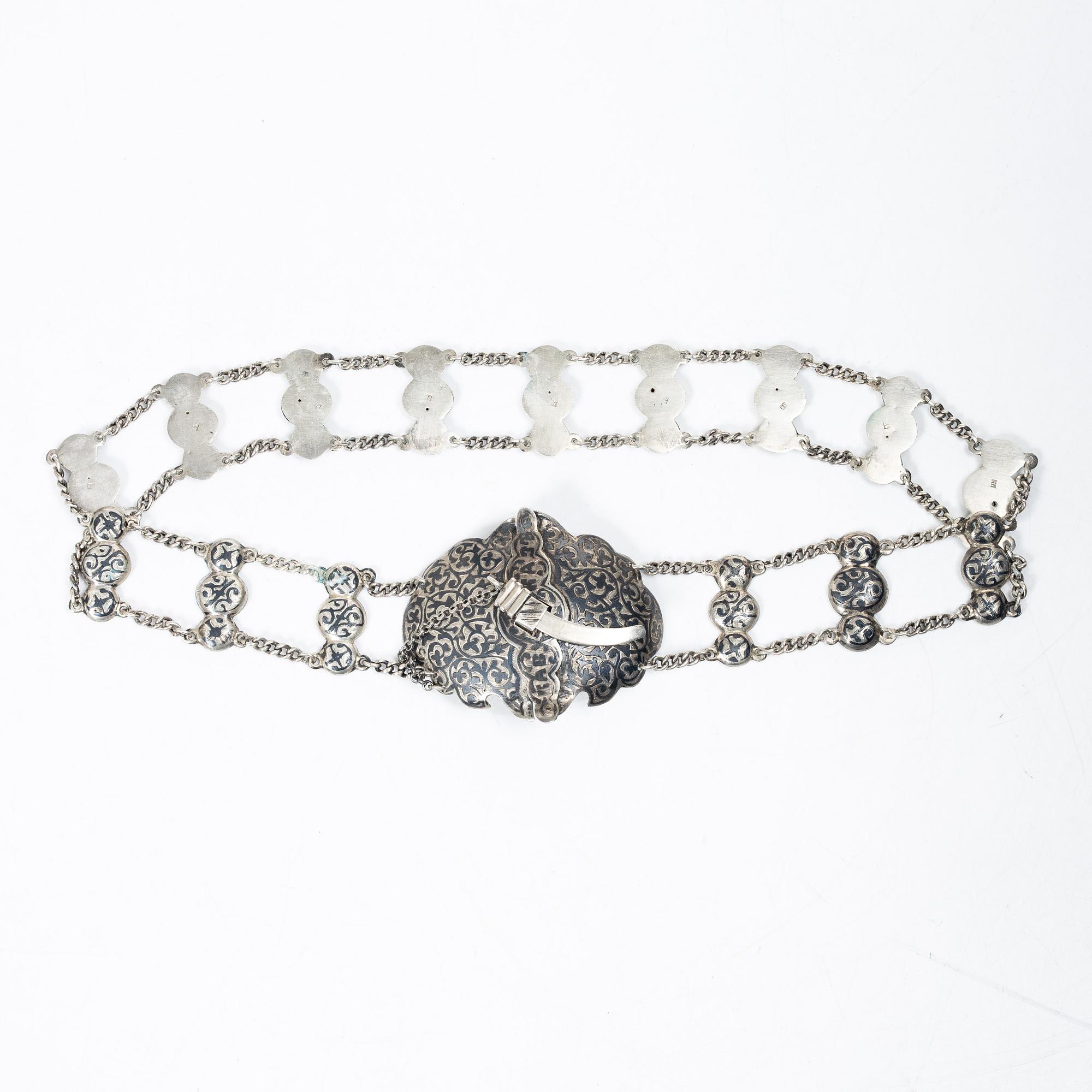 Belt/waistband and two brooches, silver, Russia 1896–1908.
