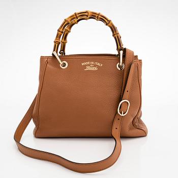 Gucci, a 'Small Bamboo Shopper' bag.