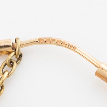 Örhängen, kreoler, hoops 18K guld, medföljande påhängen i form av ekollon med emalj med motiv av mytologiskt sjödjur.