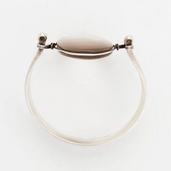 Vivianna Torun Bülow-Hübe, a sterling bangle with a qvartz, Georg Jensen, Copenhagen 1945-77, design nr 205.