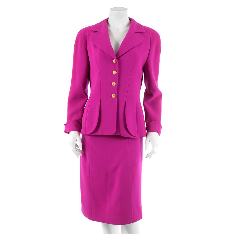 ESCADA, a hot pink wool two-piece suit consisting of a jacket and skirt. Size 42.