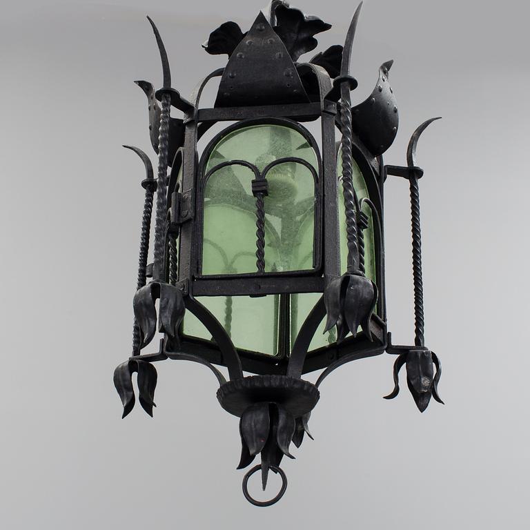A wrought iron ceiling light first half of the 20th century.