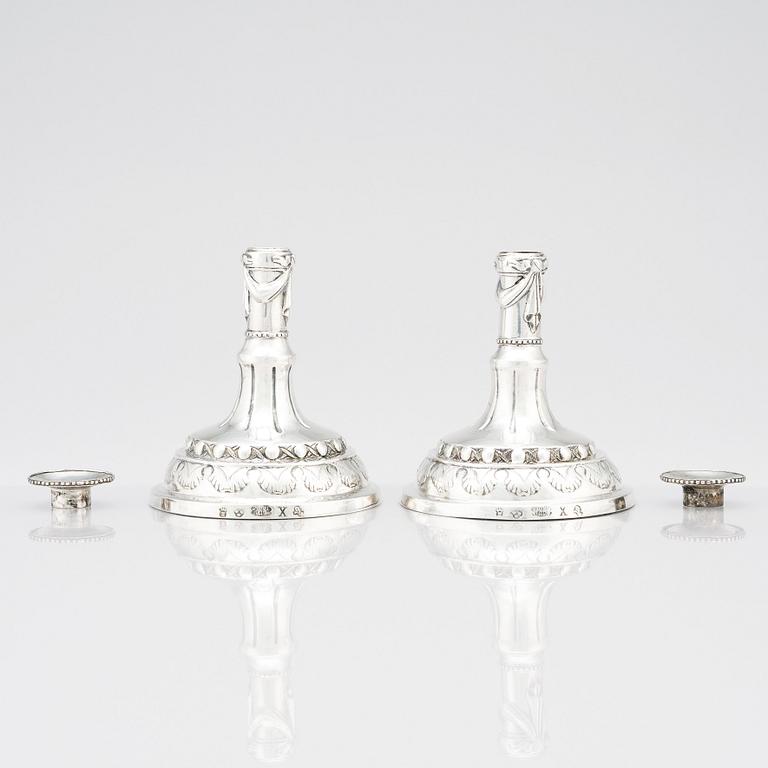 A pair of Swedish silver candlesticks, marks of Sigismund Novisadi the younger, Karlskrona 1780.