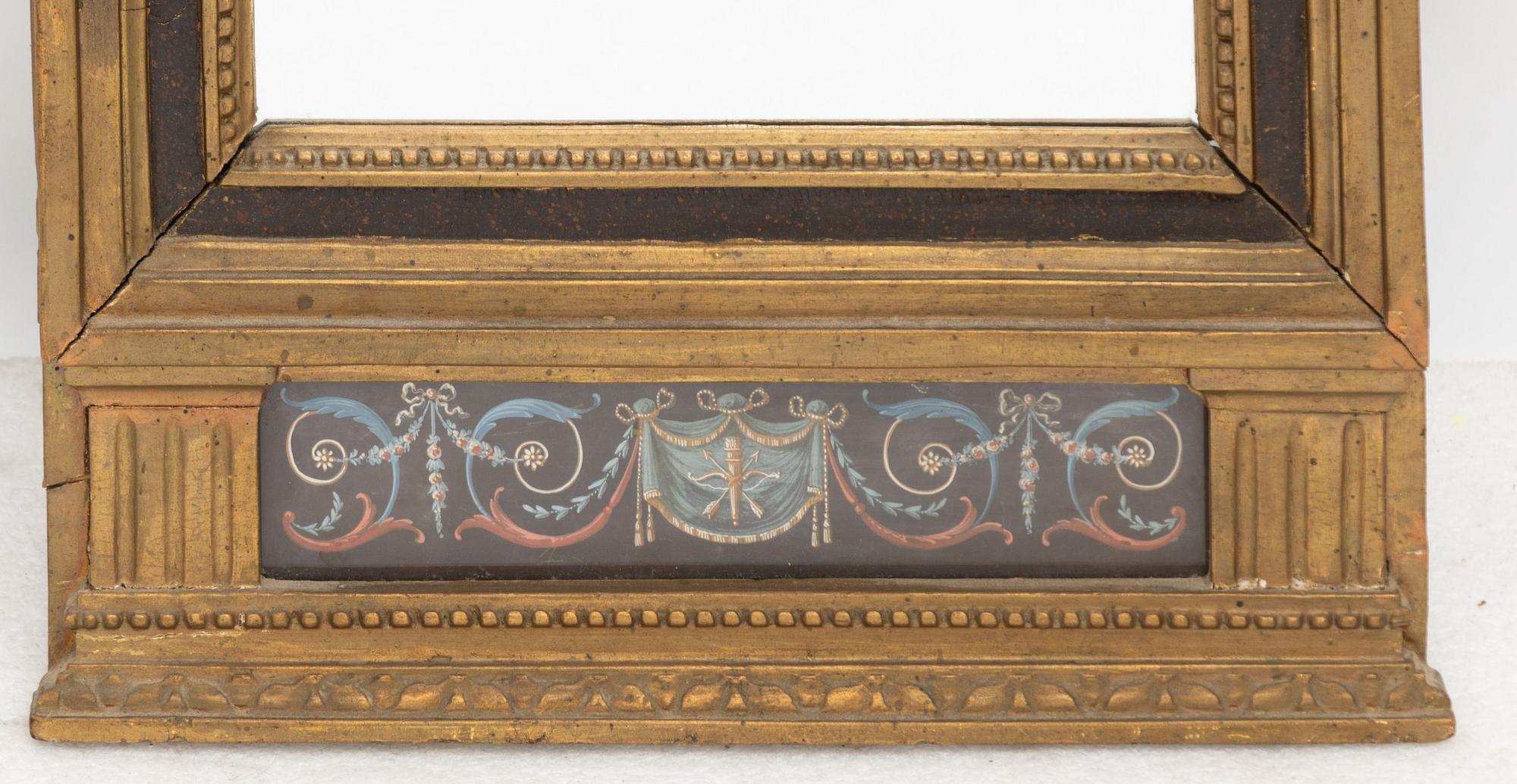 A late Gustavian mirror, circa 1800.