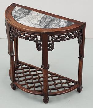 A hardwood and marble 'claw on ball' D-form console table, presumably late Qing dynasty.