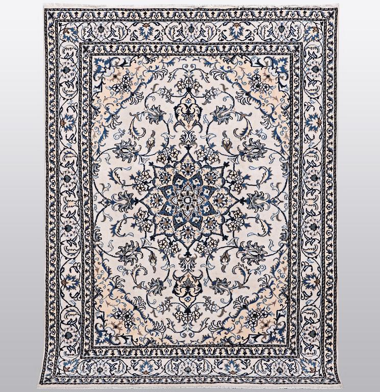 A rug, Nain, part silk, so called 9 LAA, ca 233 x 164 cm.