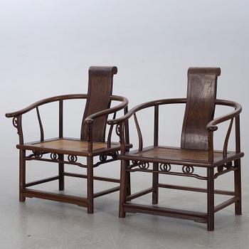 A pair of Chinese later part of the 20th century armchairs.