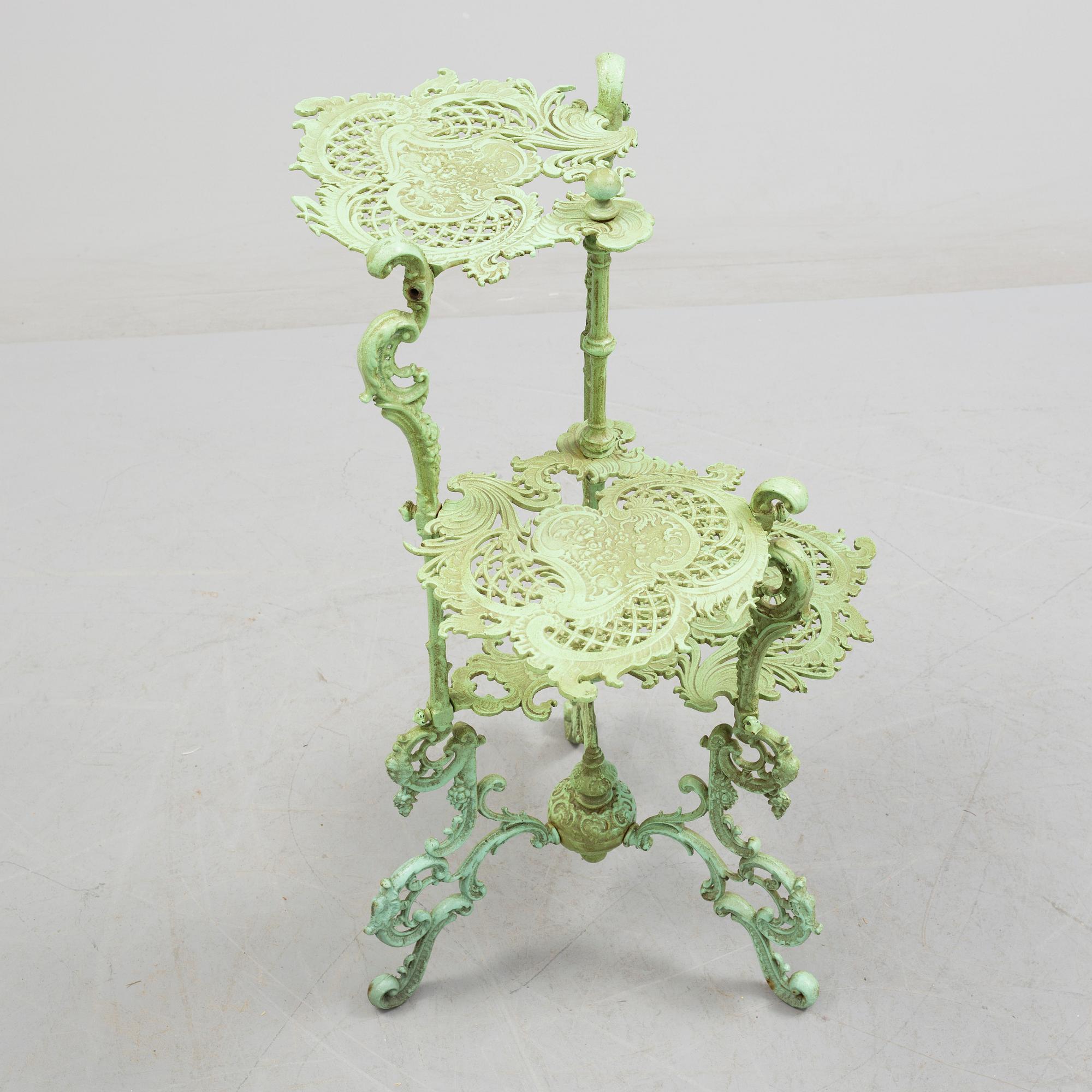 An early 20th century cast iron shelf.