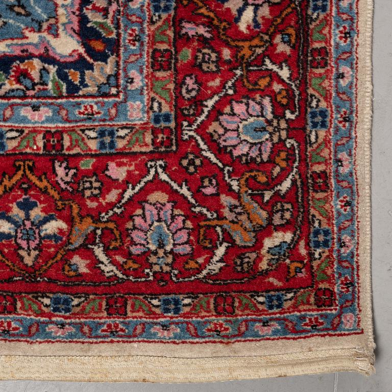 A rug, an Old Oriental,  ca 187,5 x 127 cm.