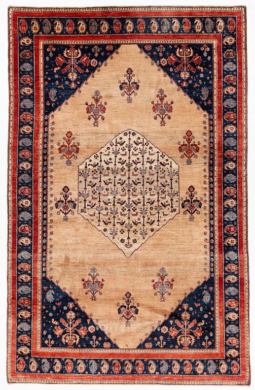 An oriental carpet, c. 325 x 210 cm.