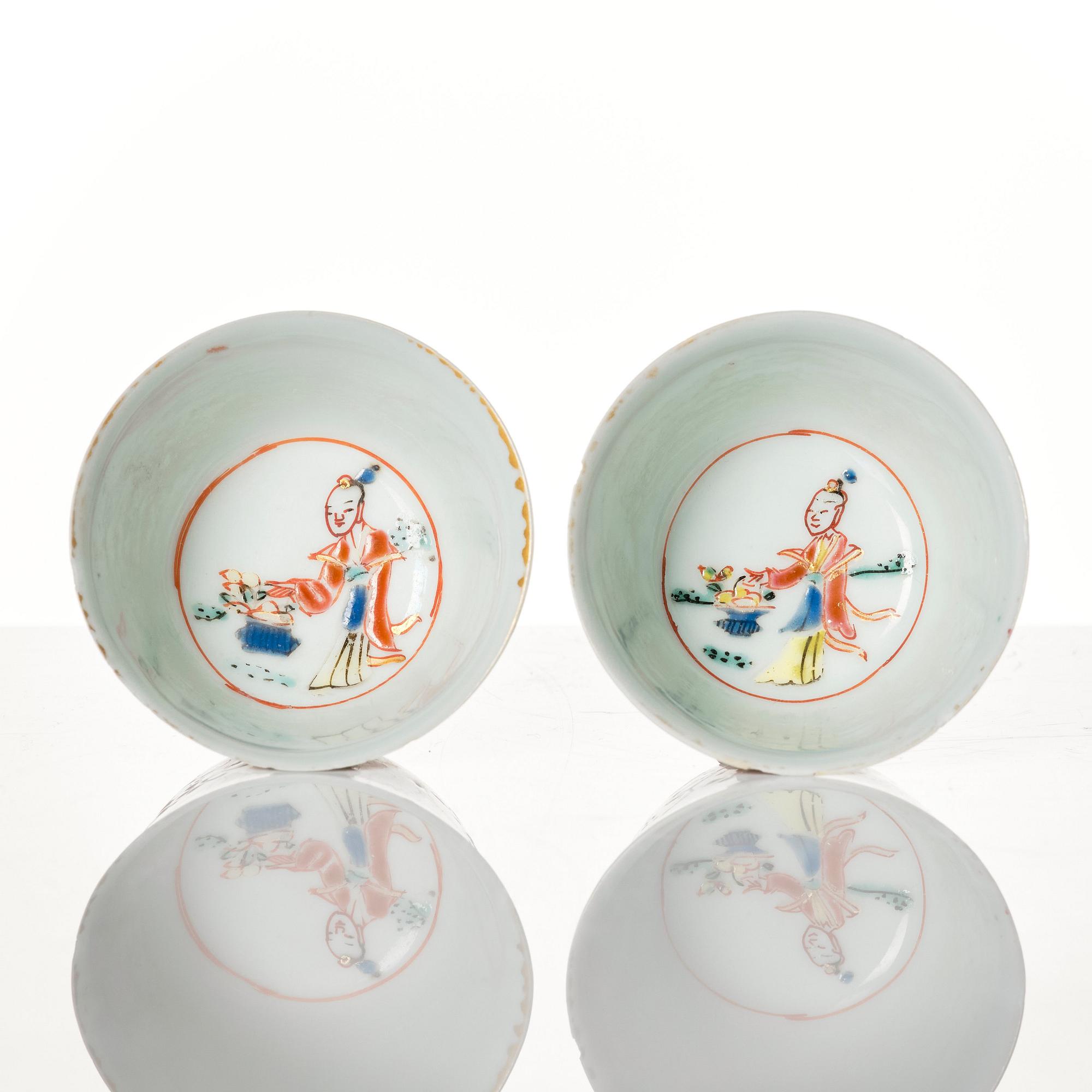 A pair of famille rose miniature cups with stands, Qing dynasty, 18th Century.