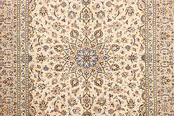 A Kashan carpet, c. 355 x 242 cm.