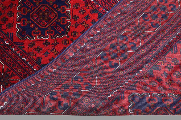 A Afghan runner carpet, 280 x 92 cm.