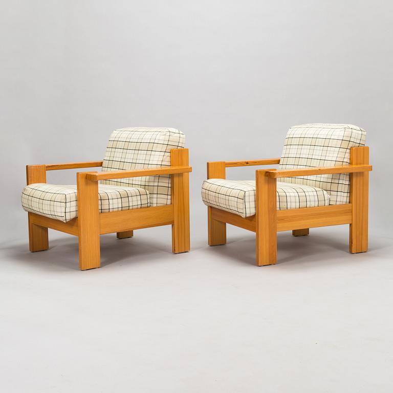 A pair of 1970's armchairs.
