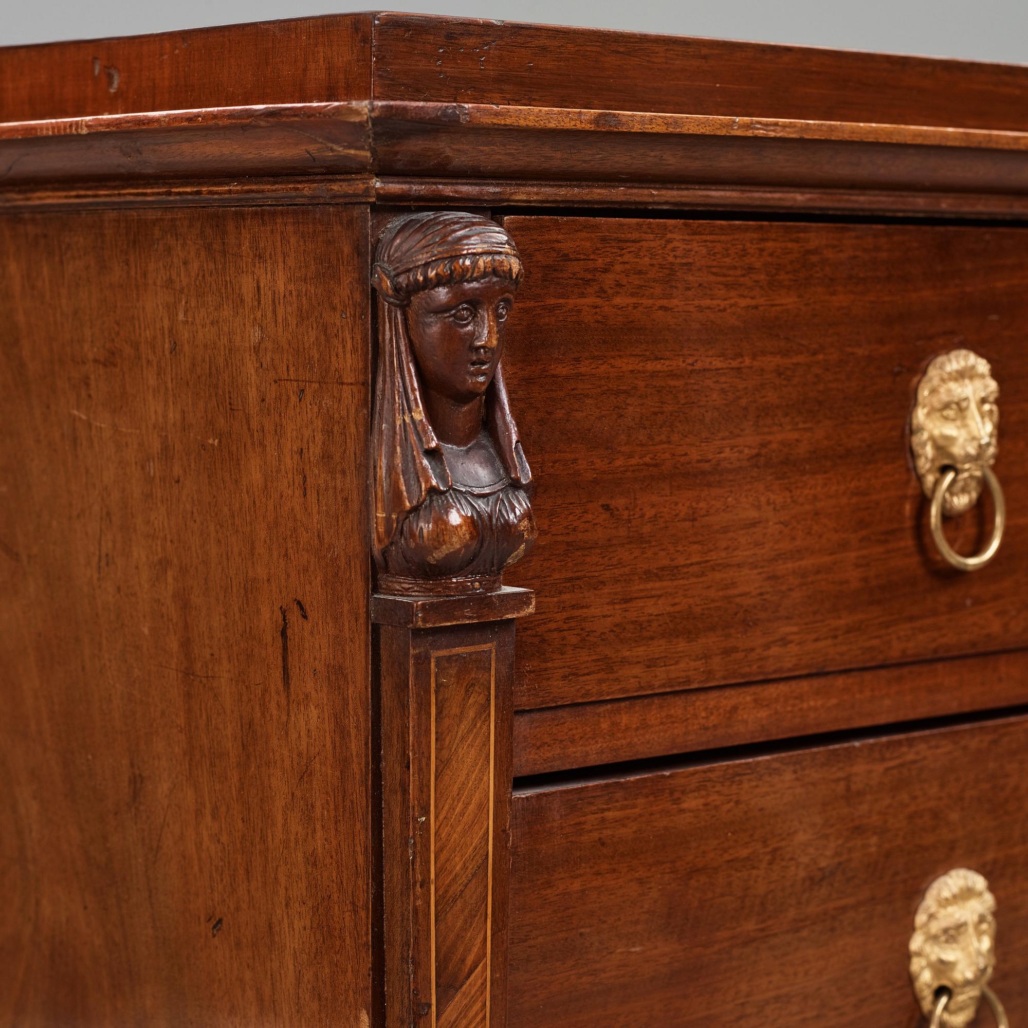 A late Gustavian mahogany and ormolu-mounted writing commode attributed to J.F. Wejssenburg (master 1795-1837).