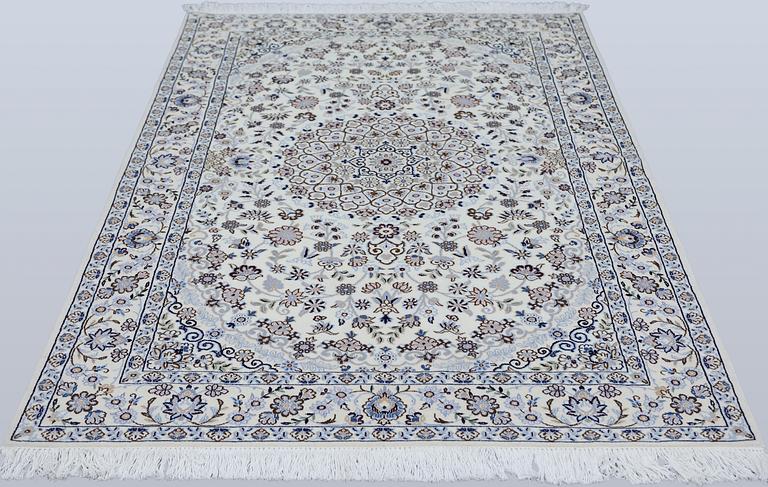 A Nain rug, part silk, so-called 9LAA, approx. 206 x 133 cm.