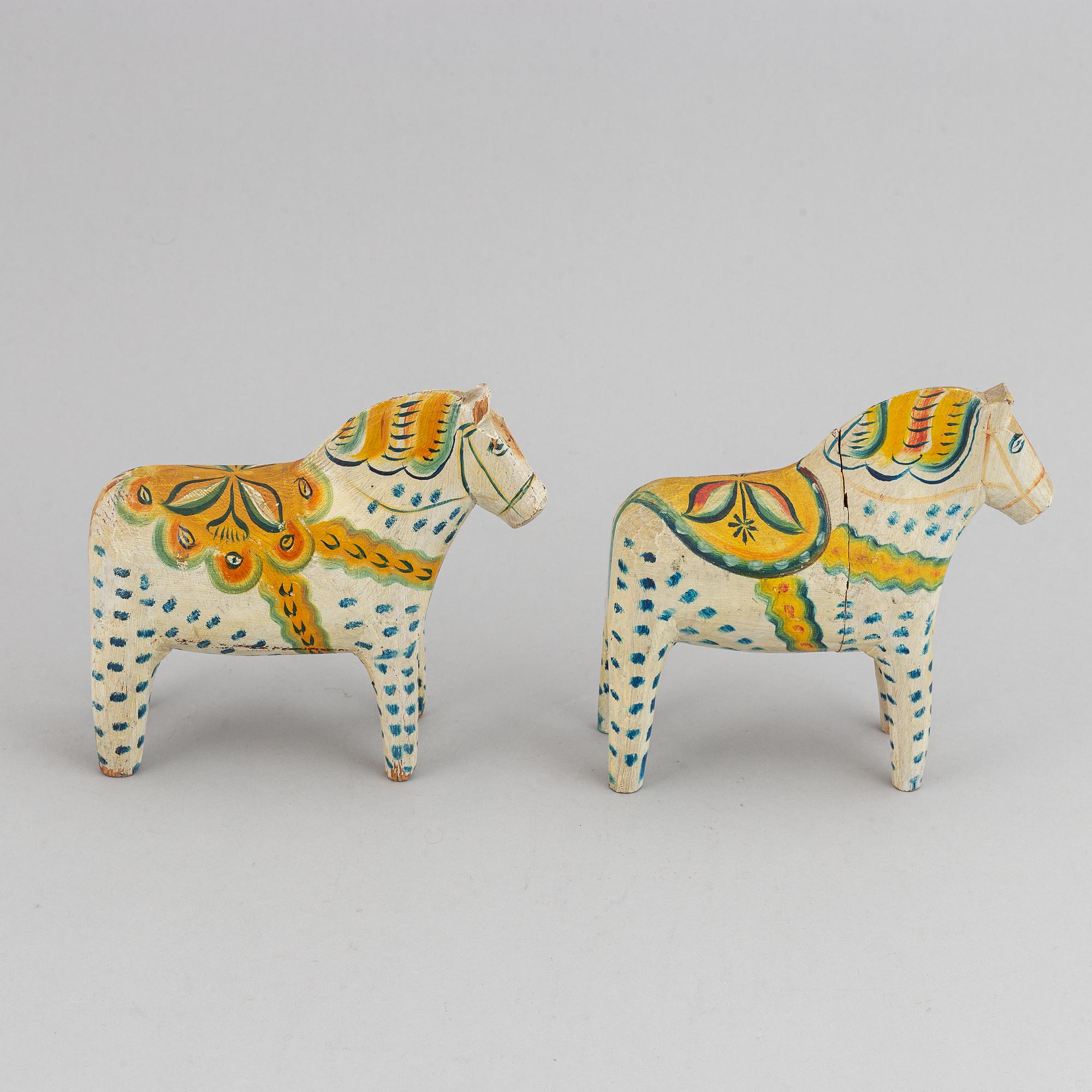 Two 20th century painted wooden horses.