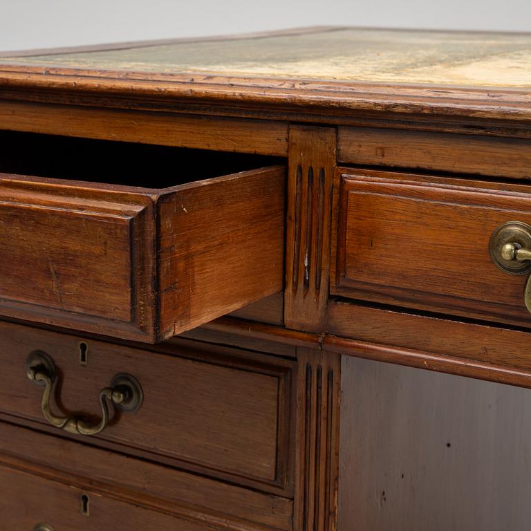 A 20th century writing desk, England.