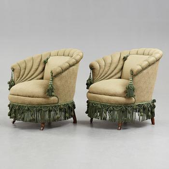 A pair of easy chairs, circa 1900.