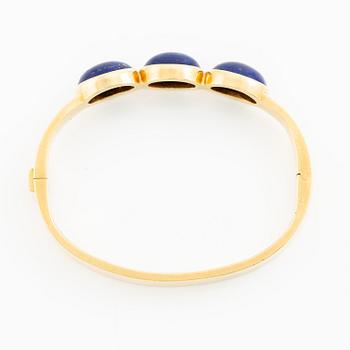 Wiwen Nilsson, a bracelet, 18K gold with lapis lazuli, Lund 1965.