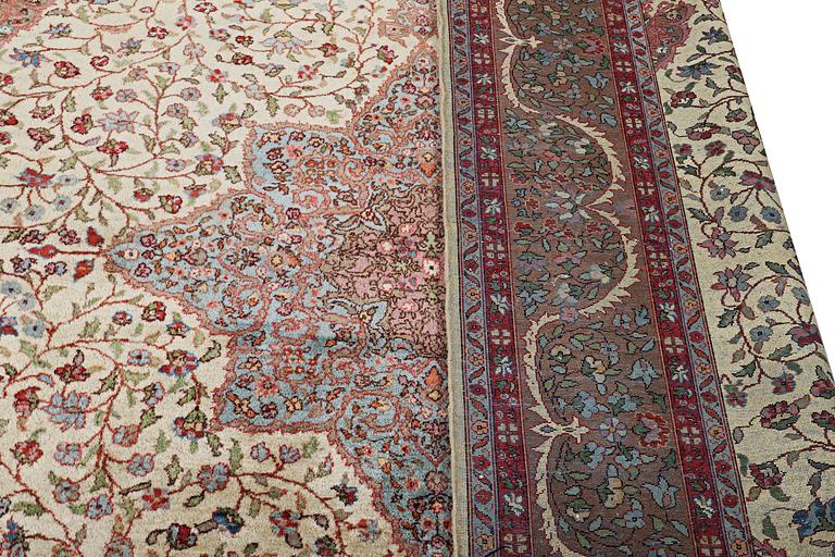 An Eastern European carpet, c. 333 x 250 cm.