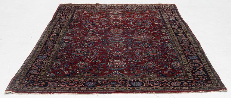 A Kashan rug, c. 208 x 138 cm.