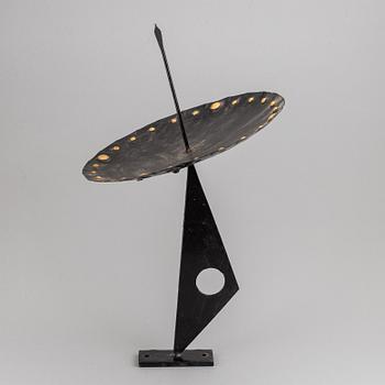 A 20th century painted metal sun dia, signed SLl.
