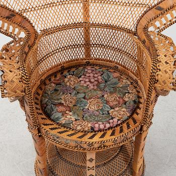 A peacock rattan chair, 20th Century.