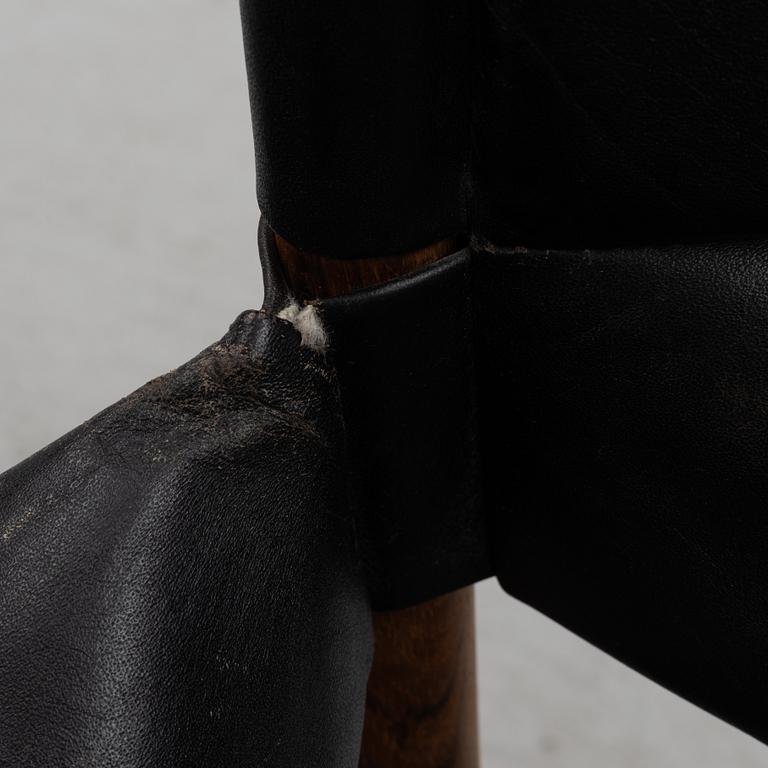 Kristian Solmer Vedel, a pair of "Modus" armchairs and a low table, Søren Willadsen, 1960's.